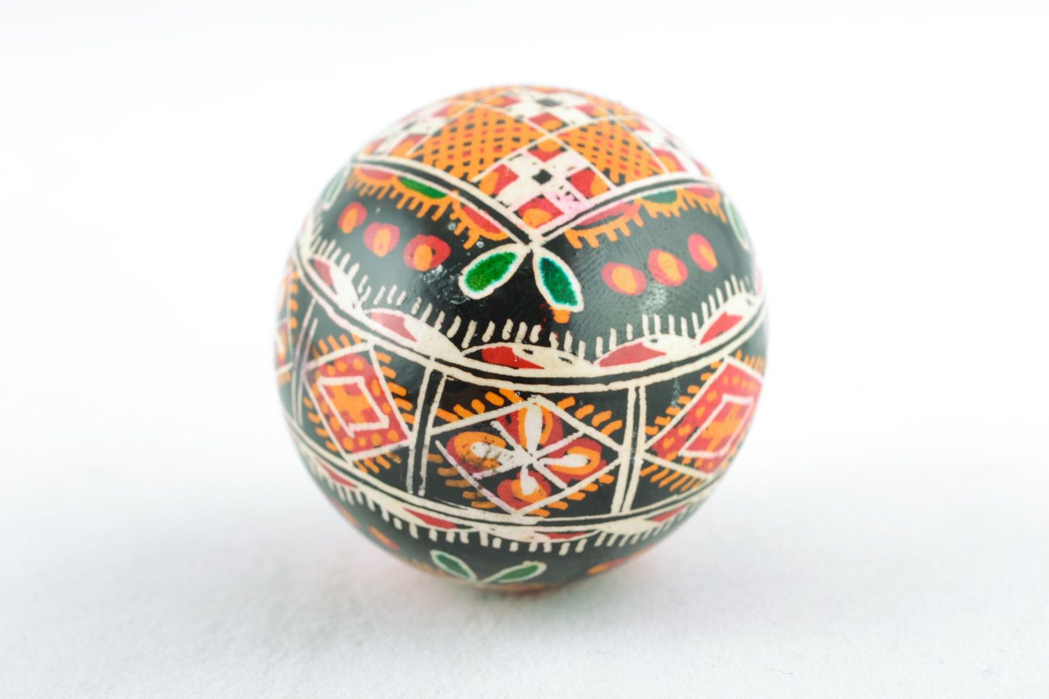 Homemade ornamented Easter egg pysanka with traditional painting made with hot wax photo 5