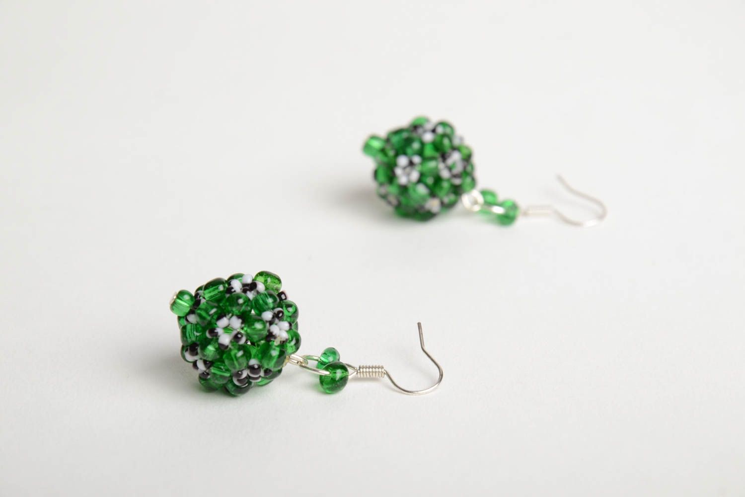 Handmade beautiful ball-shaped dangling earrings crocheted of green beads photo 3