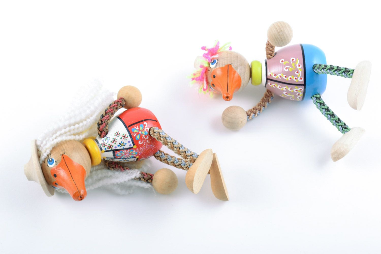 Деревянные игрушки уточки 2 штуки ручной работы с росписью детские красивые фото 5