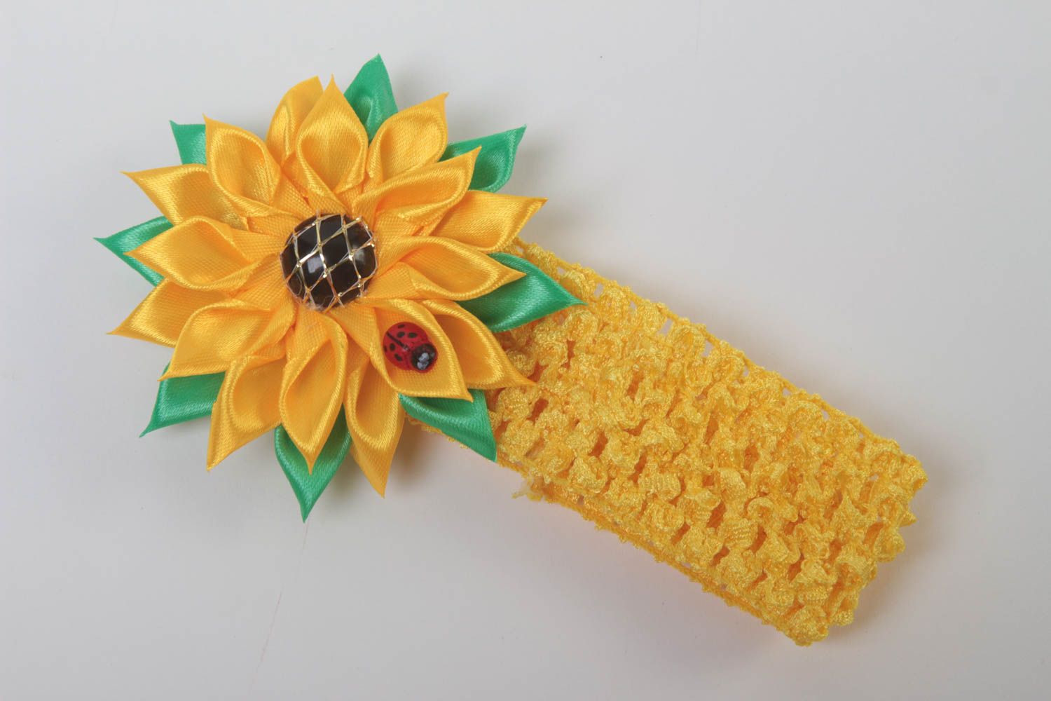 Детская повязка на голову с цветком подсолнуха в технике канзаши желтая хендмейд фото 2