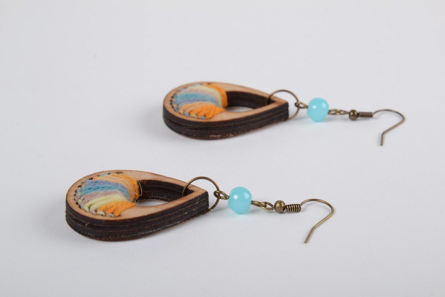 Handmade plywood earrings with colored thread embroidery in the form of droplets photo 2