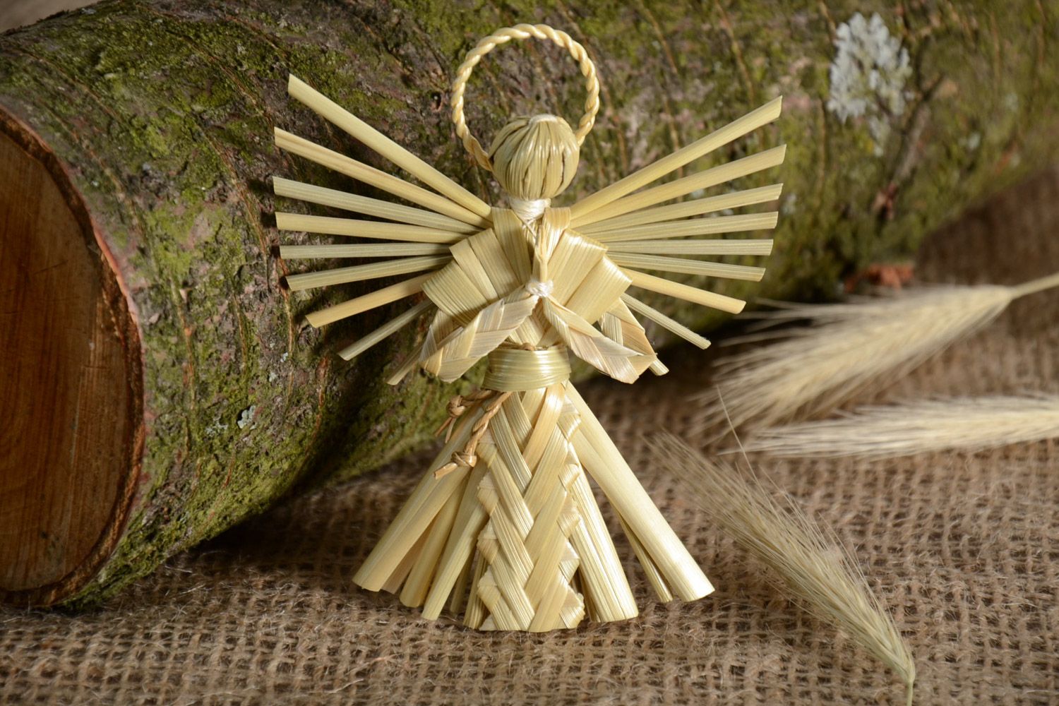 Small handmade figurine of angel woven of natural straw for interior decoration photo 1