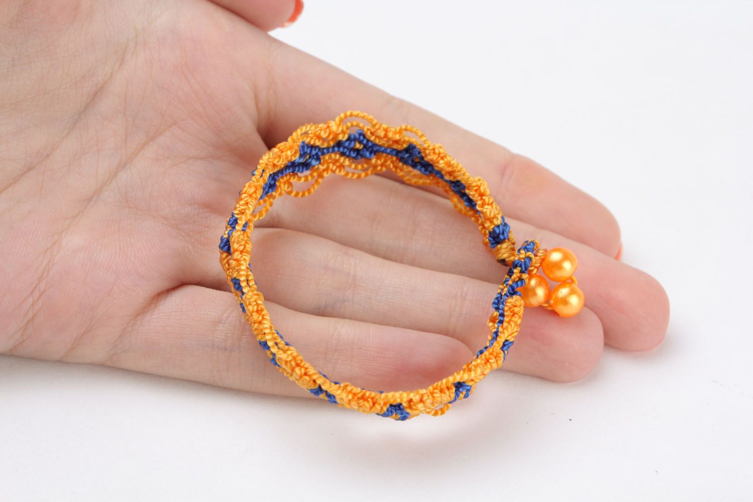 Yellow and blue woven bracelet photo 4