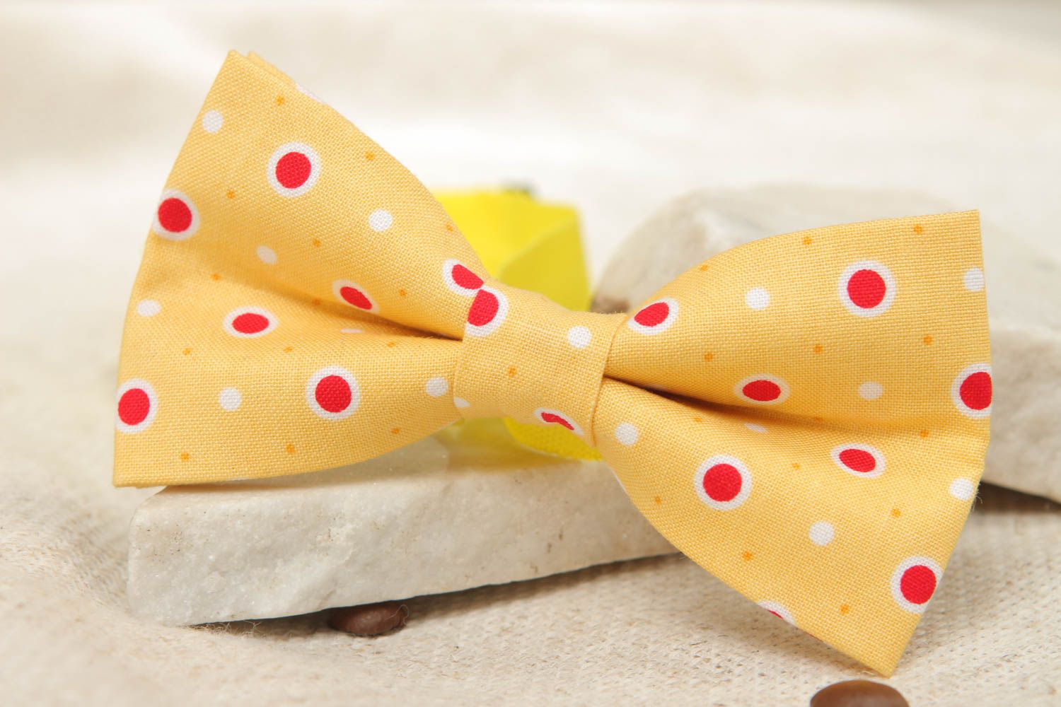 Bow tie made of yellow polka dot fabric photo 5