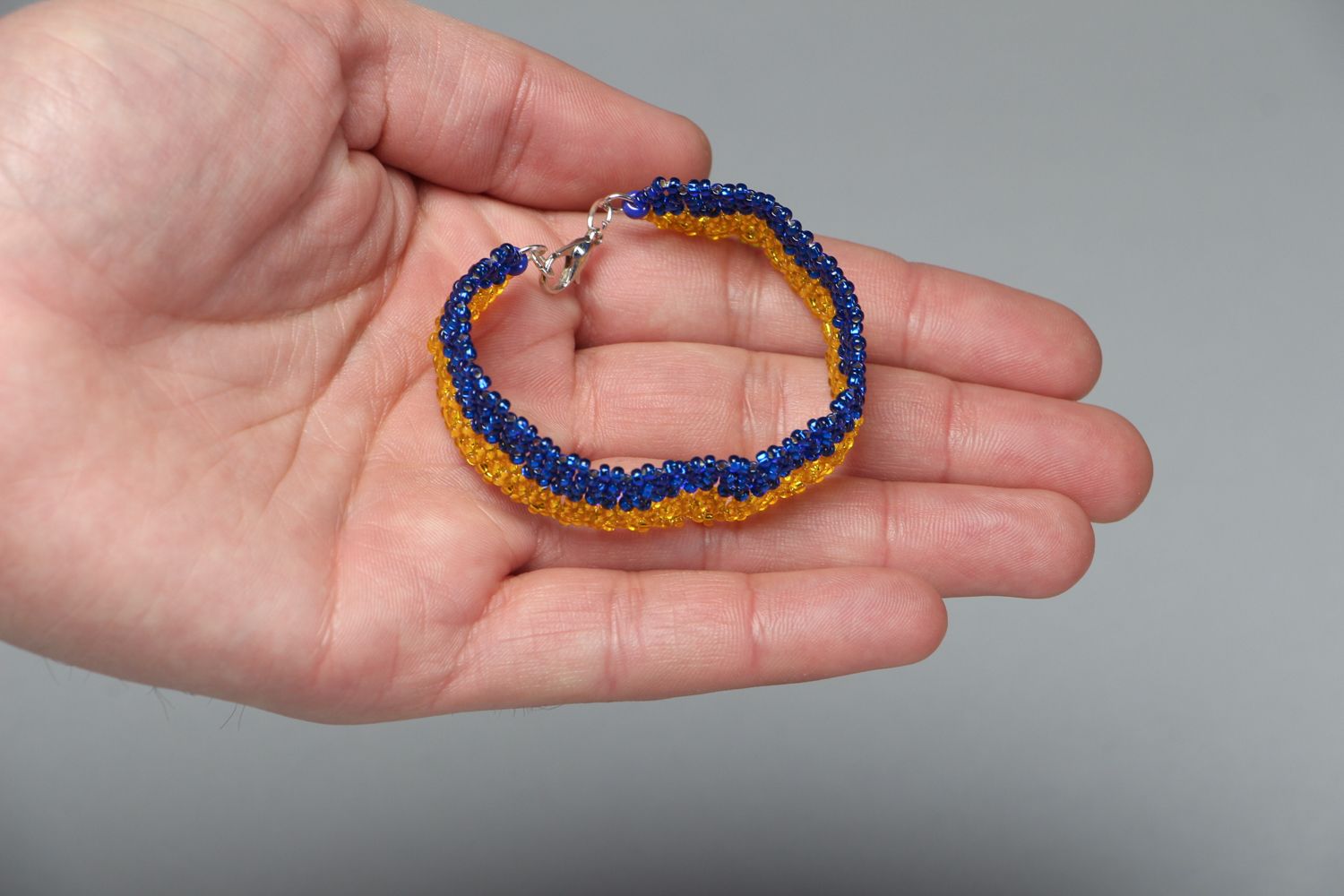 Handmade beaded bracelet in blue and yellow color  photo 3