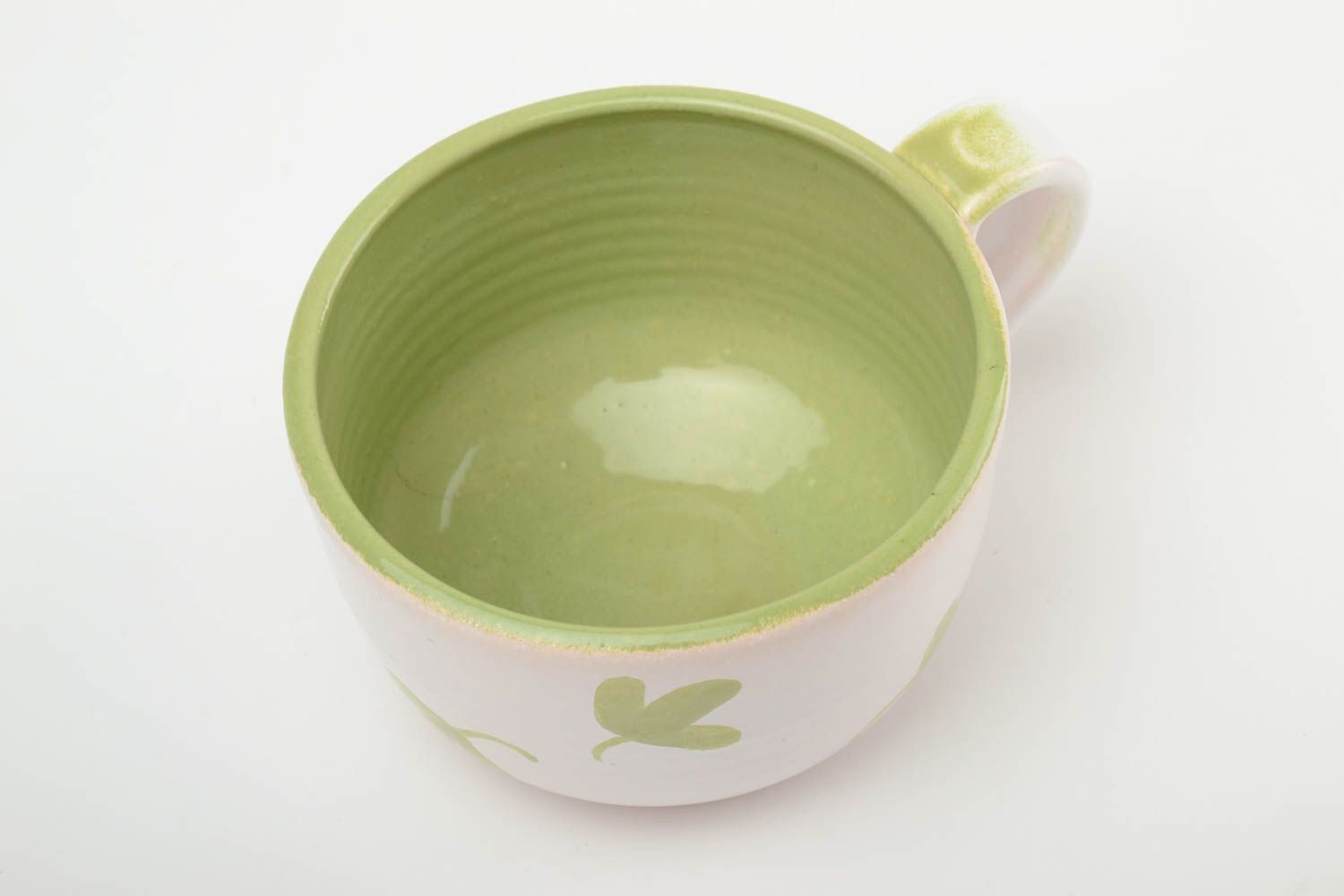 Глиняная чашка ручной работы глазурованная с эмалью салатовая в листики 350 мл фото 2