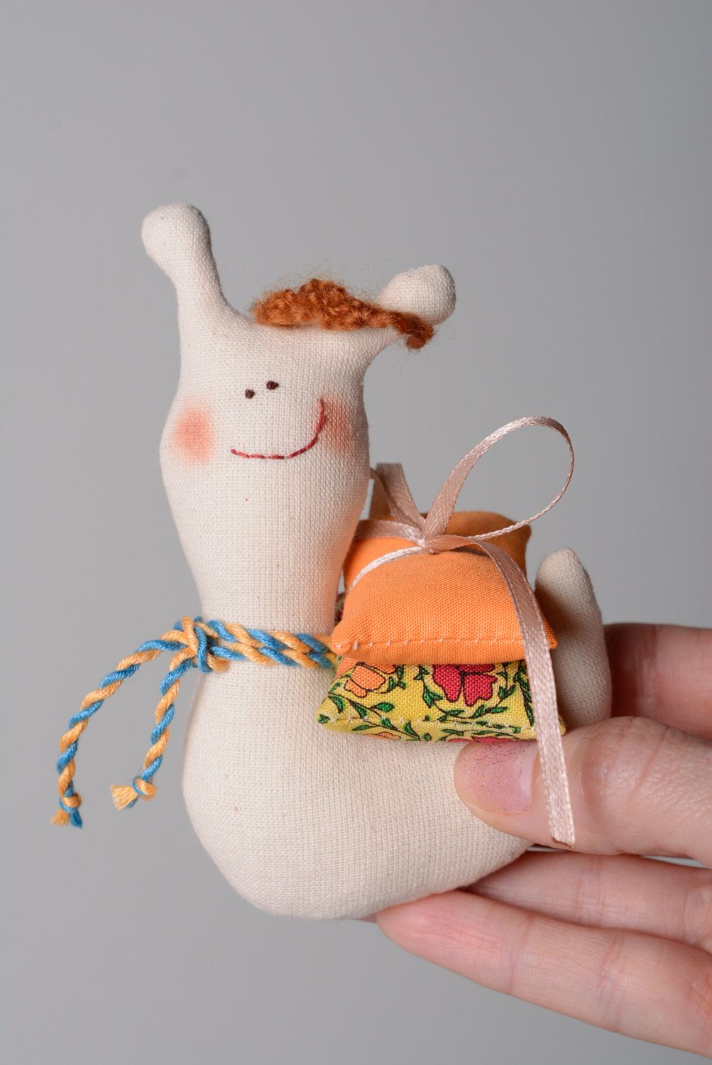 Small handmade designer soft toy sewn of natural fabrics in the shape of snail photo 3