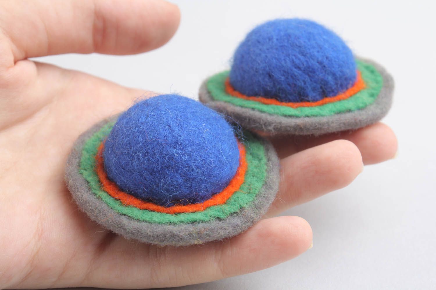 Round earrings made of wool and felt using felting technique photo 2
