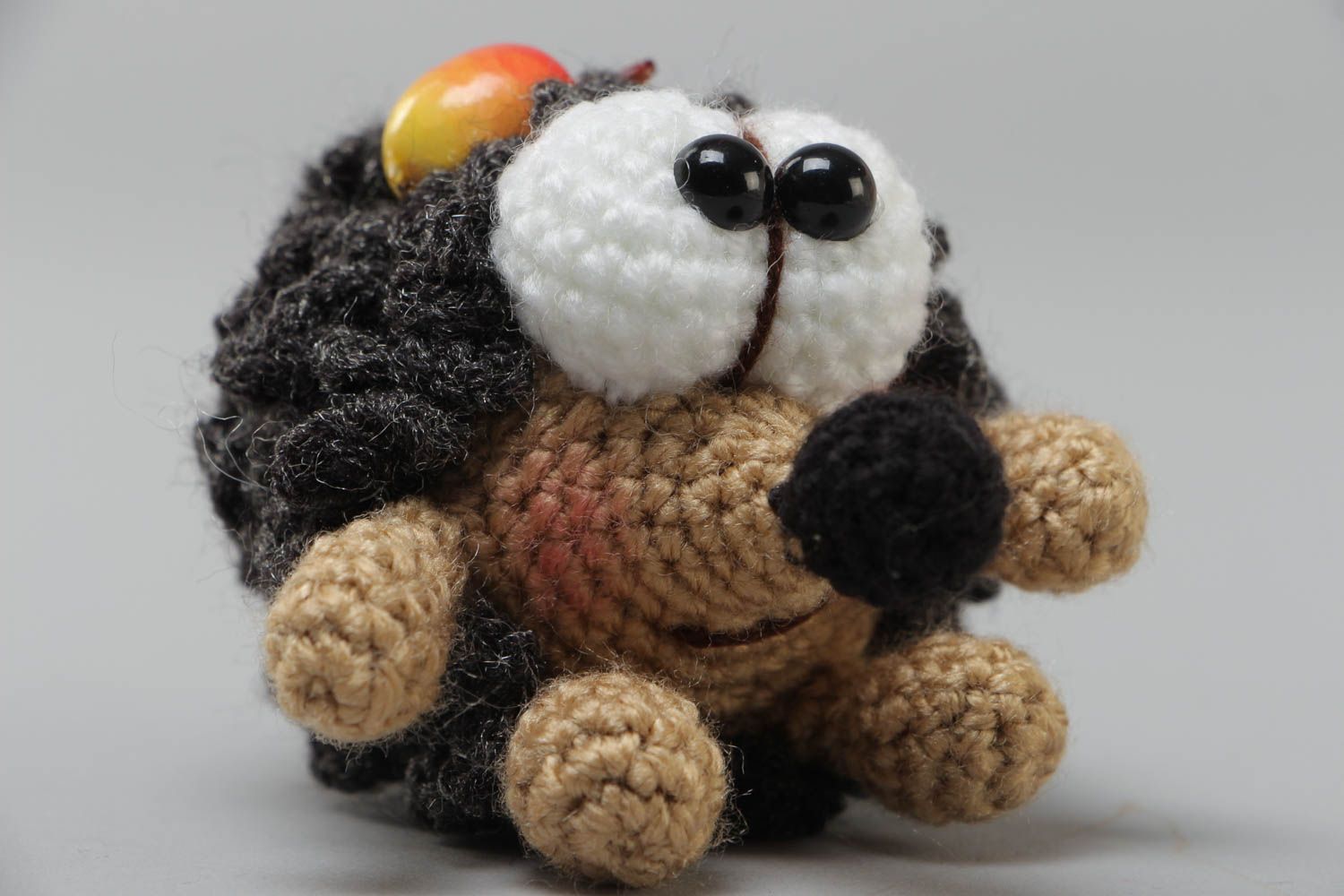 Handmade soft toy crocheted of acrylic threads funny hedgehog with apple photo 3