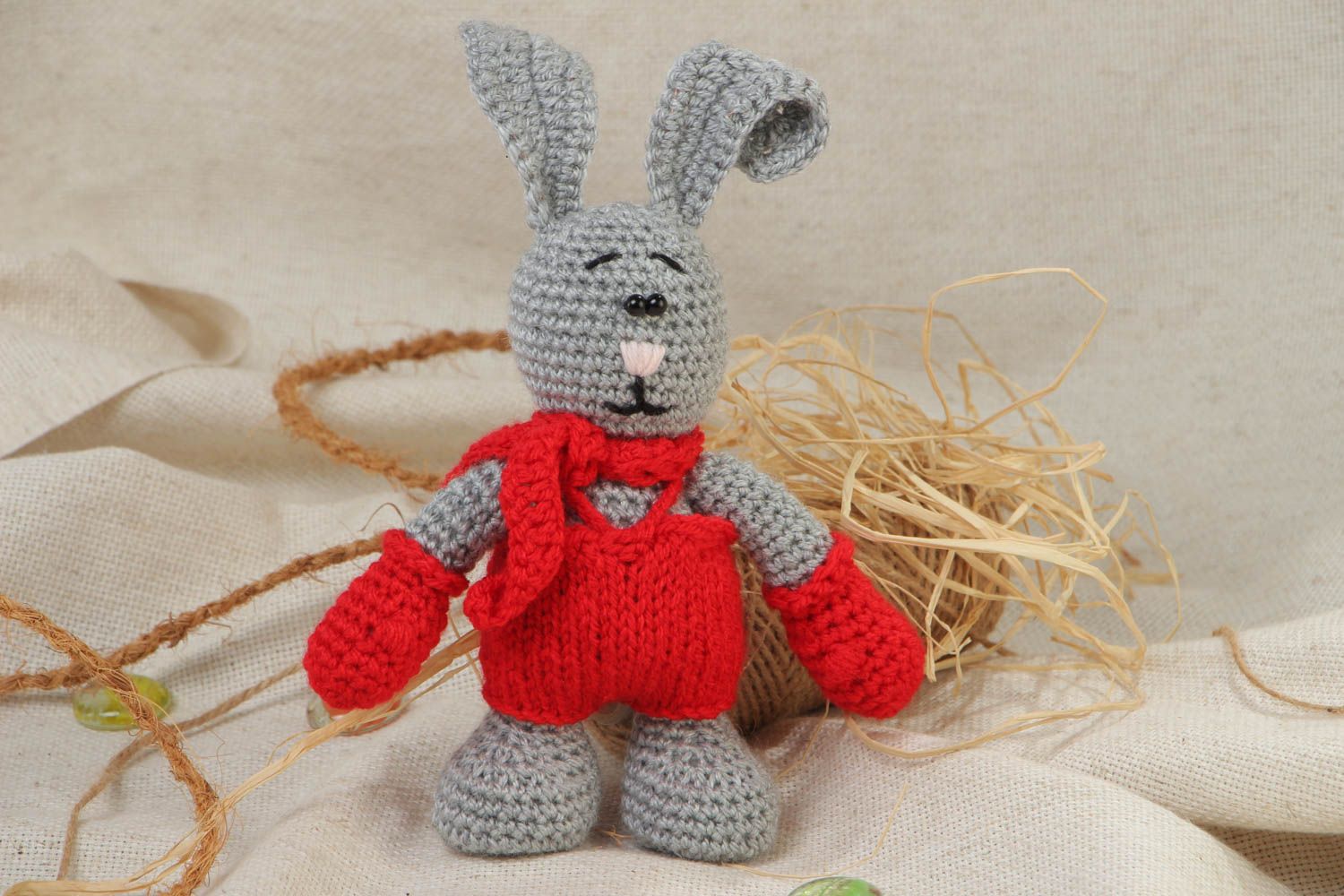 Handmade soft toy gray rabbit crocheted of acrylic threads with red scarf  photo 1