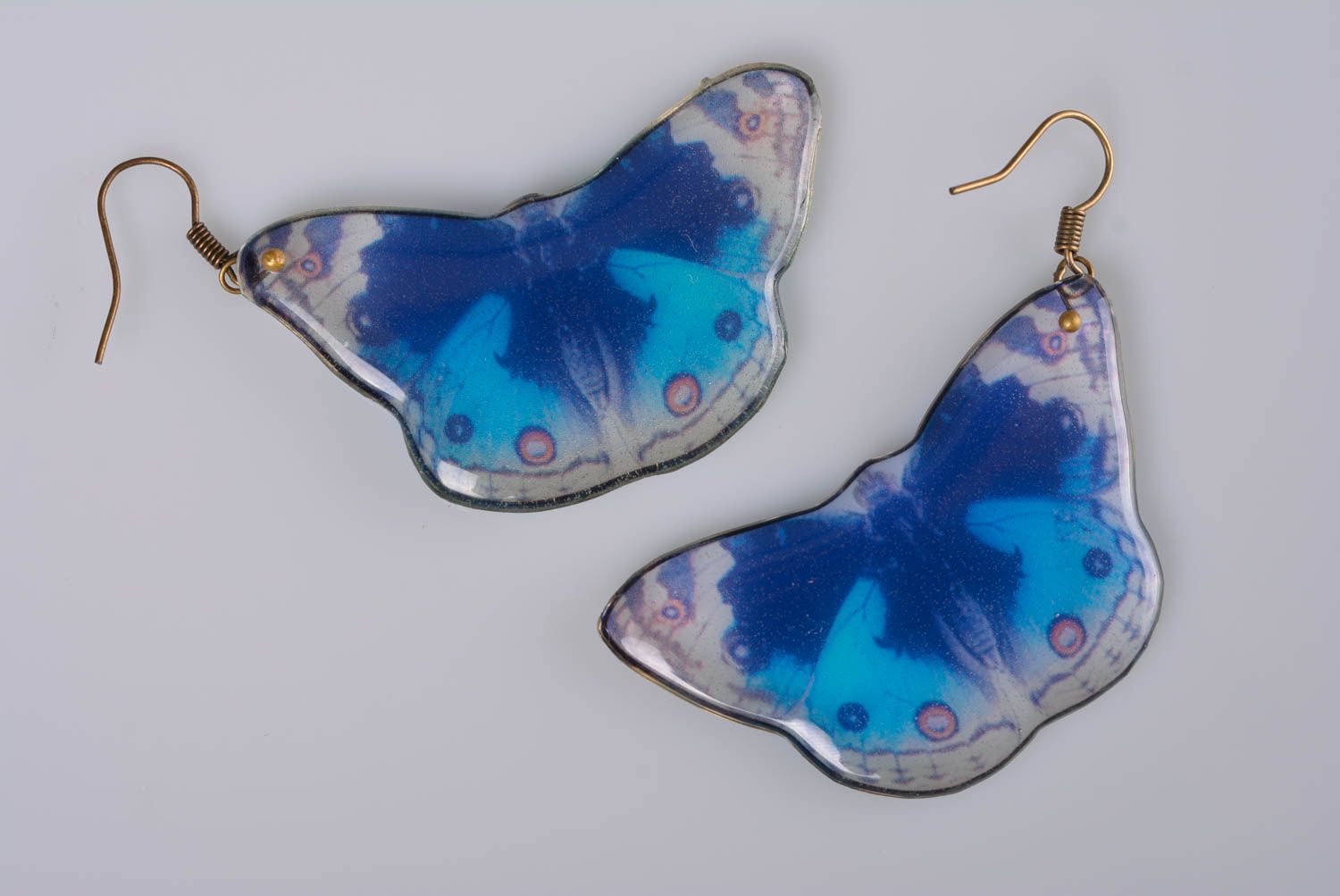 Bright summer handmade earrings of epoxy resin with blue butterflies photo 3