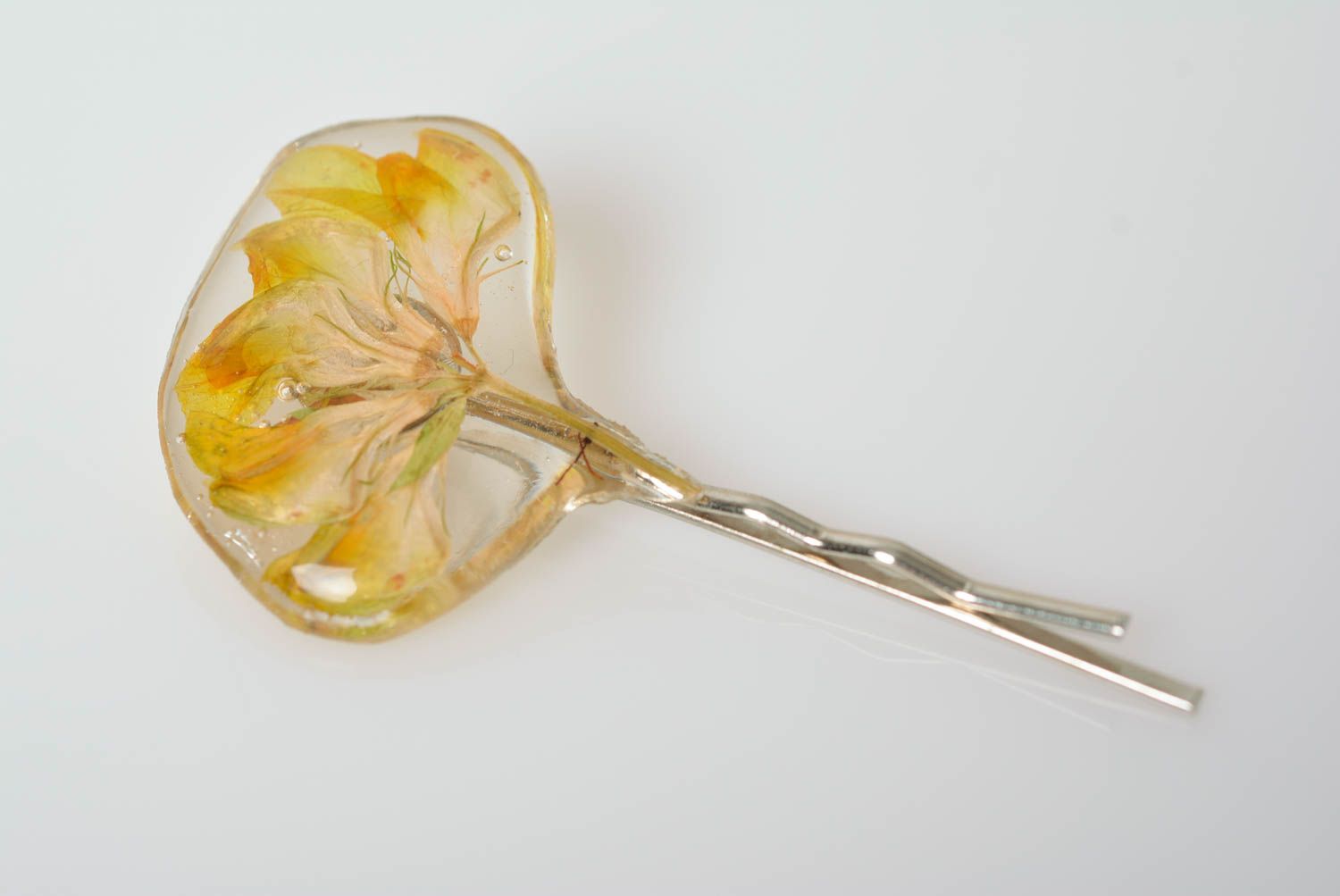 Handmade decorative metal hair pin with yellow dried flower in epoxy resin photo 5