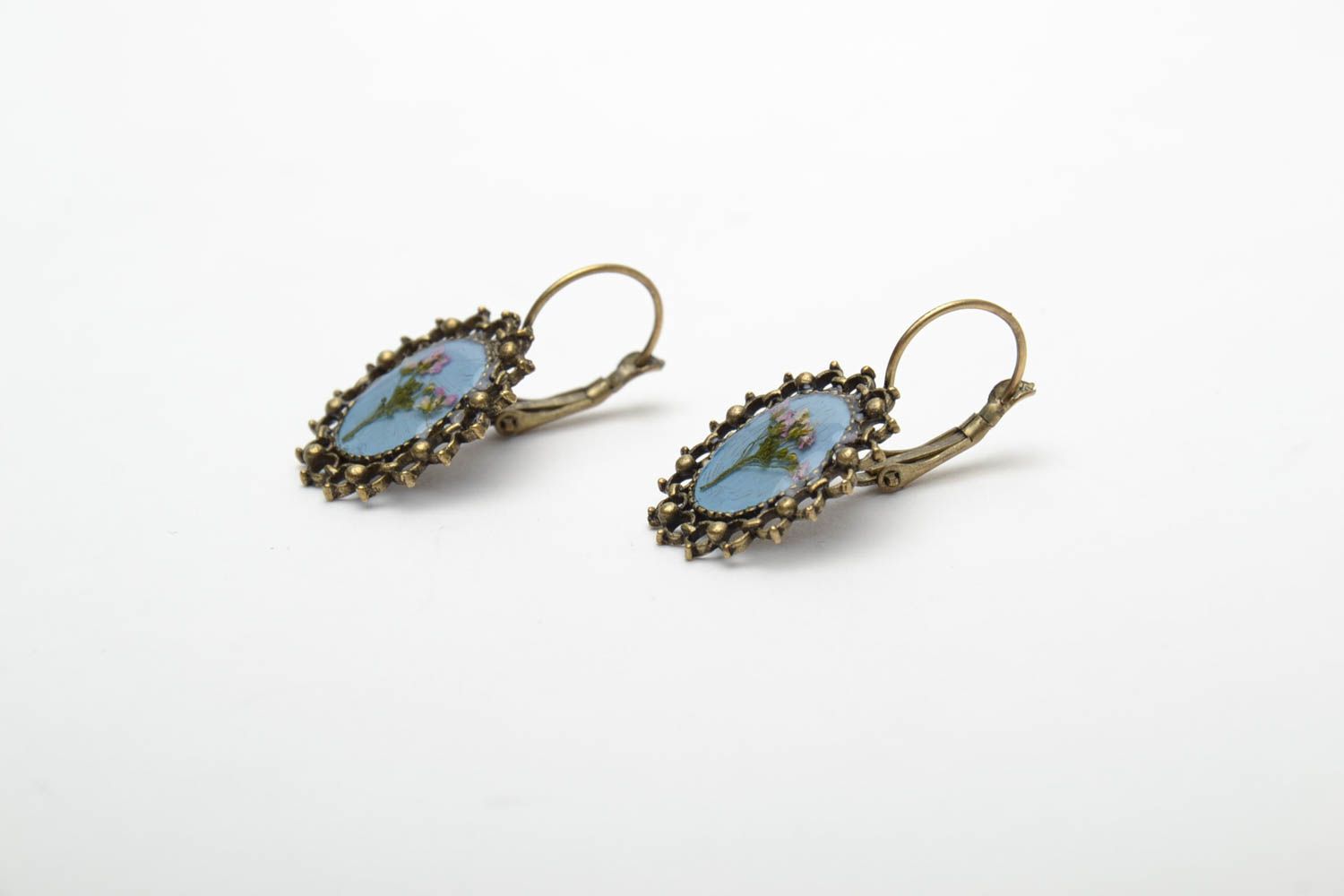 Earrings with natural flowers in epoxy resin photo 4