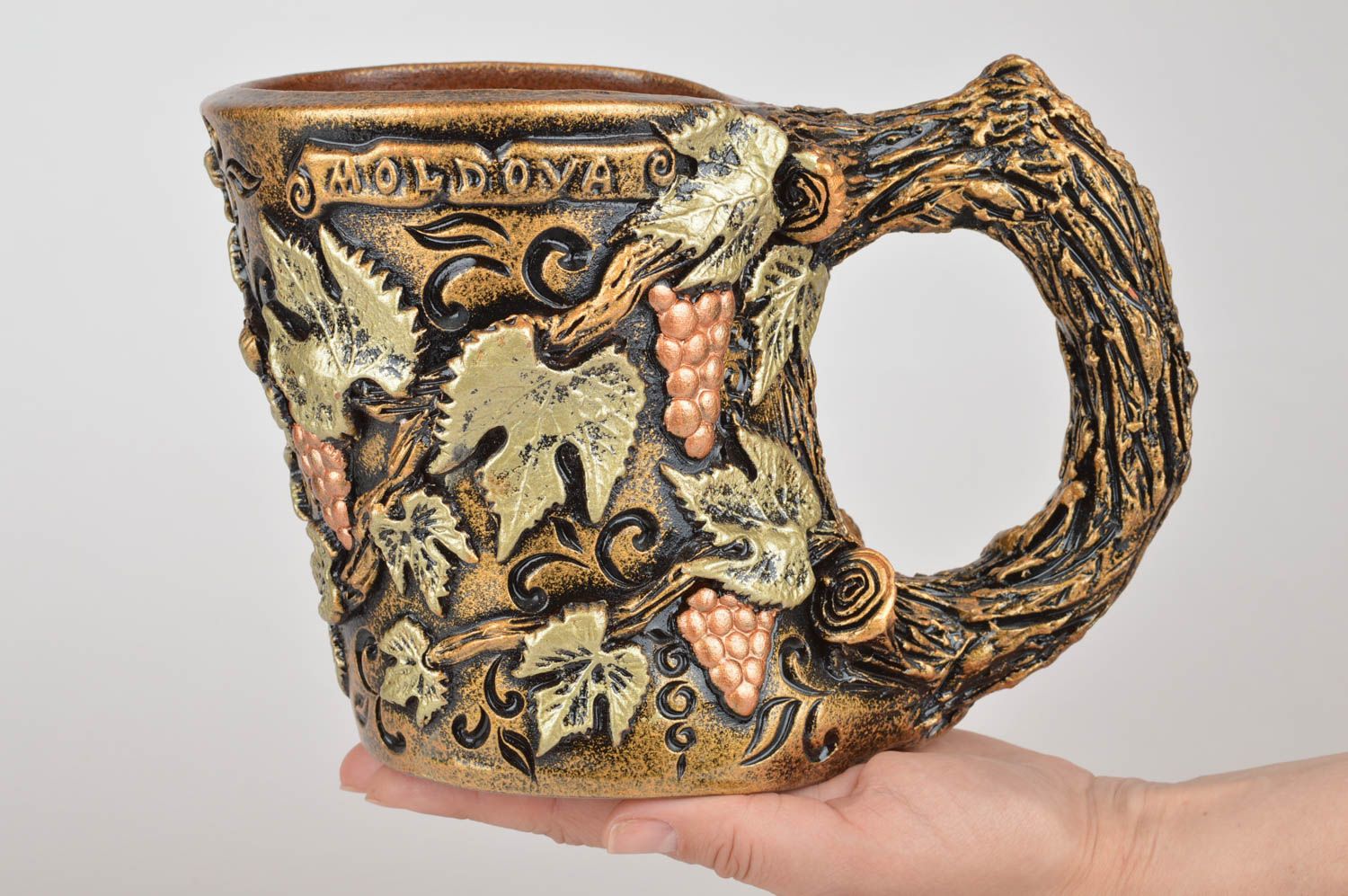 Decorative handmade holder for wine or champagne bottles in form of ceramic mug photo 3