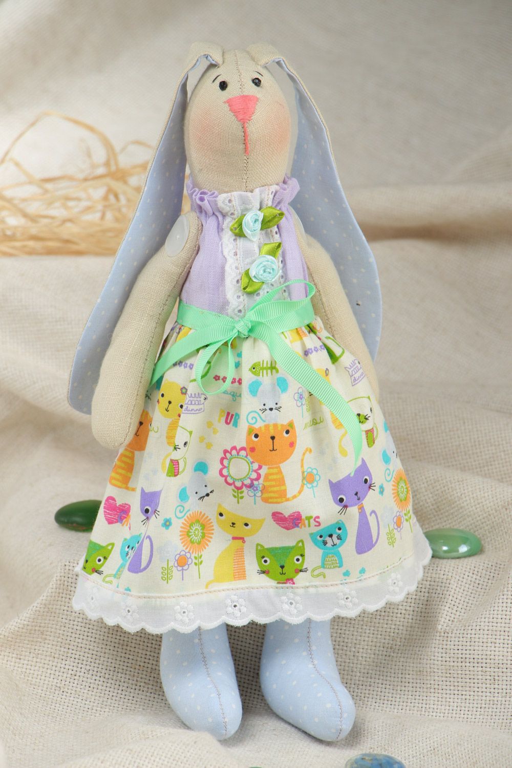 Handmade beautiful soft toy rabbit with long ears sewn of cotton fabric photo 1