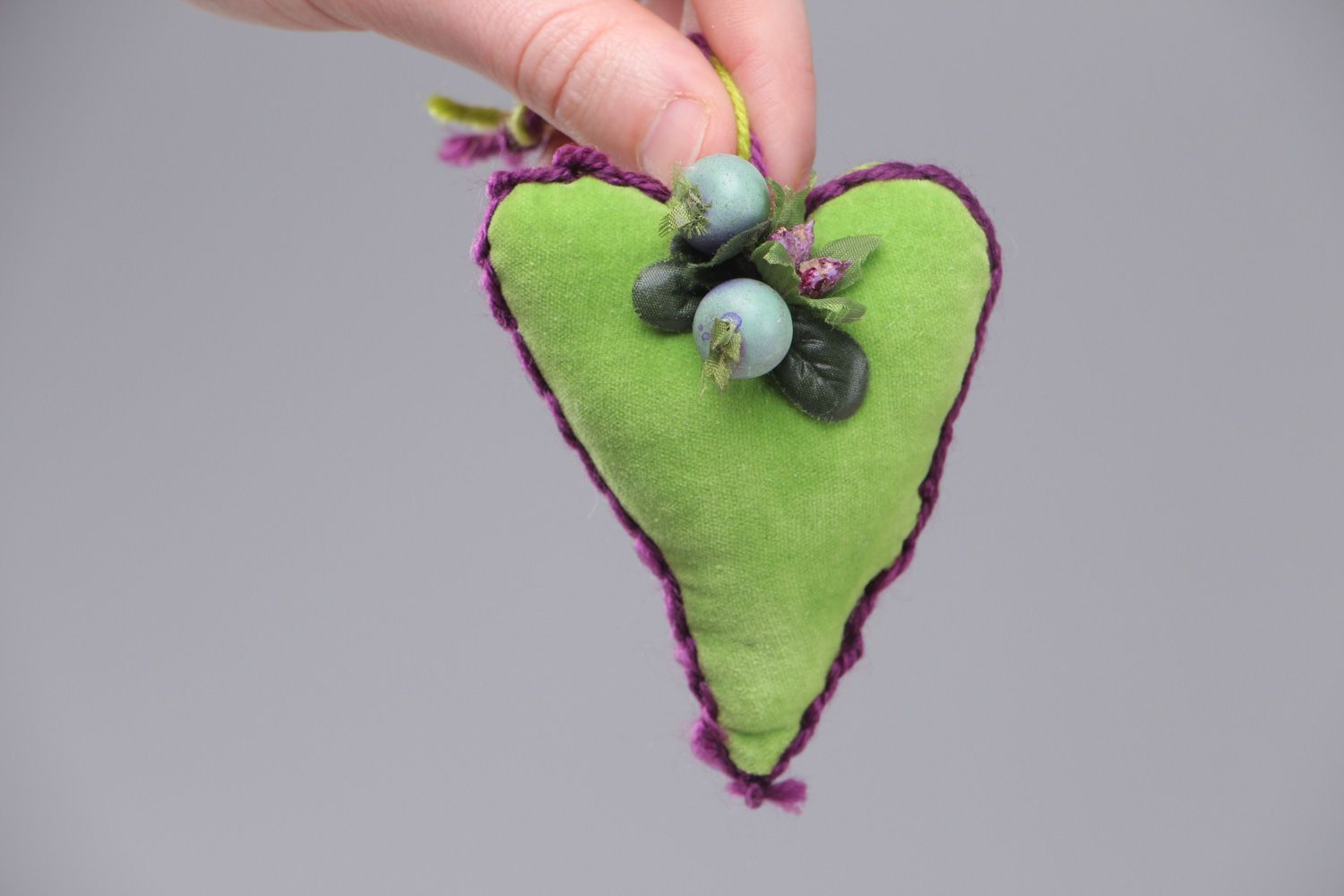 Small handmade heart-shaped wall hanging sewn of green velor for interior decor photo 4
