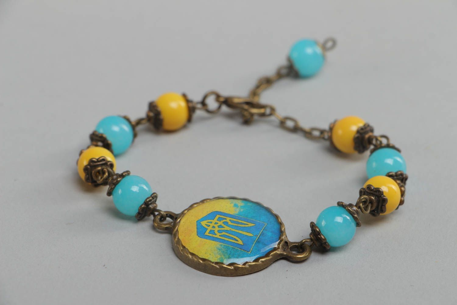 Handmade blue and yellow bright glass glaze wrist bracelet in Ukrainian style photo 3