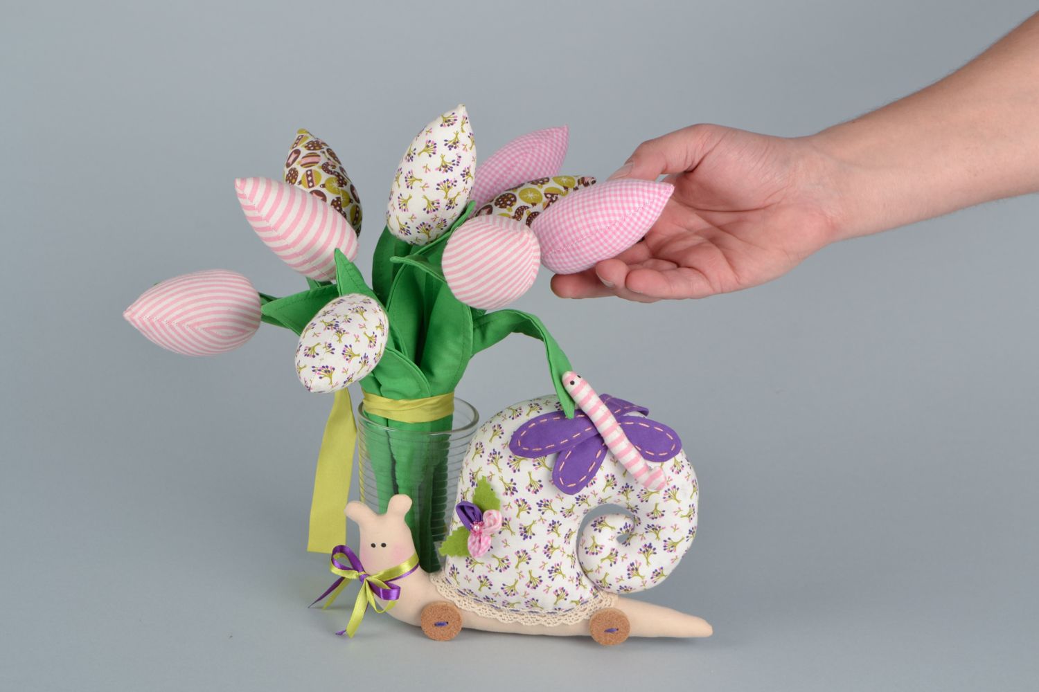 Interior decorative composition soft toy snail with tulips and decorative flowers photo 2