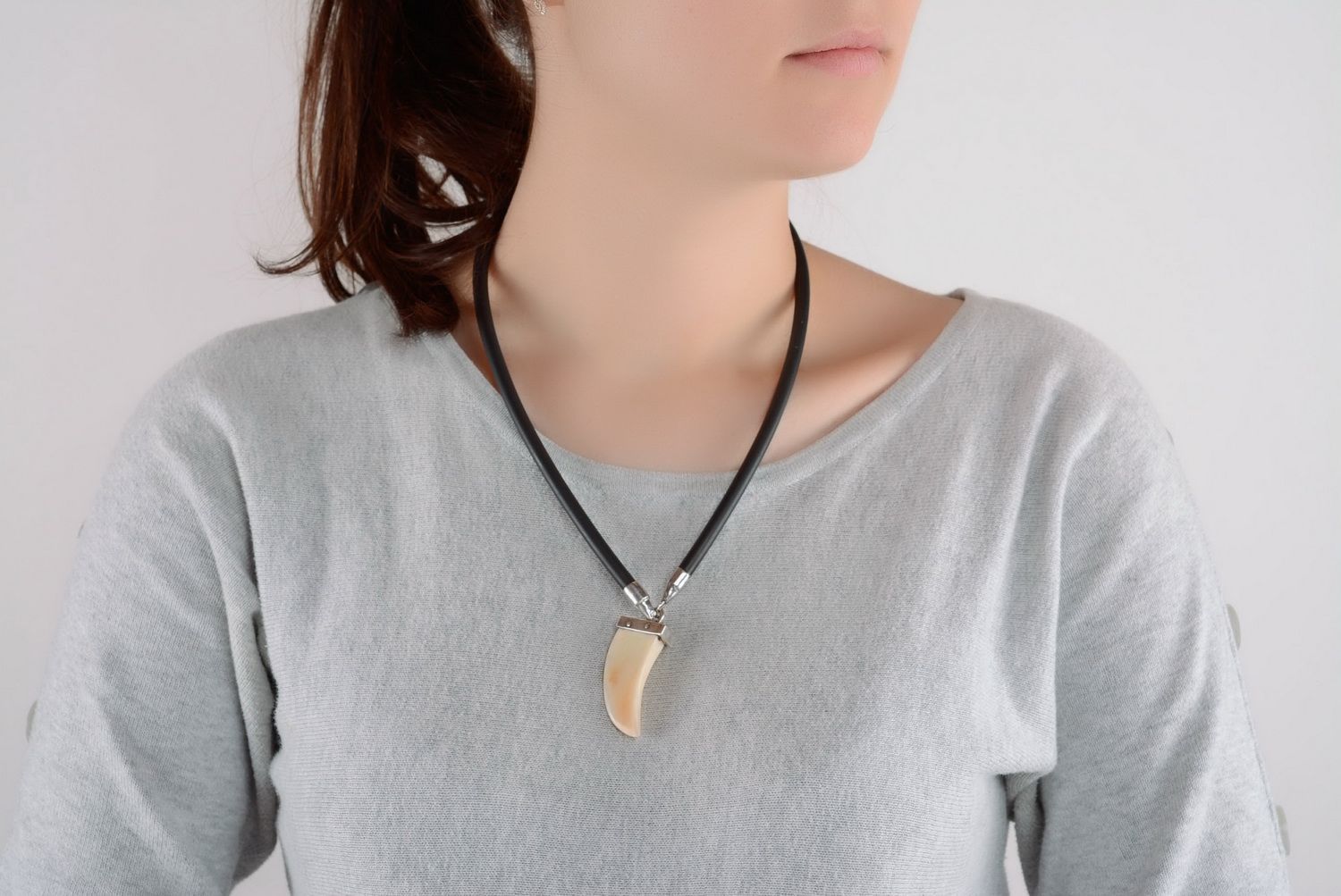 Pendant made of a wild boar's tusk photo 1