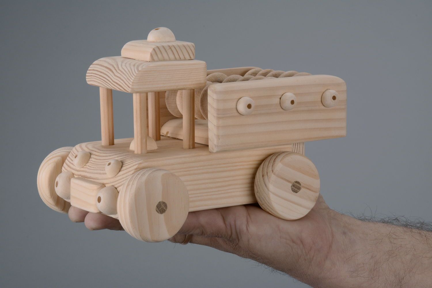 Macchina giocattolo fatta a mano giocattolo di legno giocattolo da bambino
 foto 2