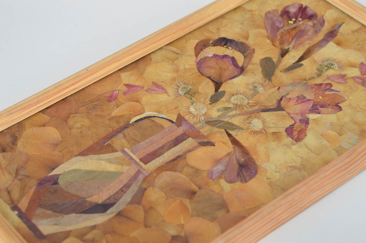 Beautiful homemade picture on fabric basis with dry leaves and flowers Tulips photo 2