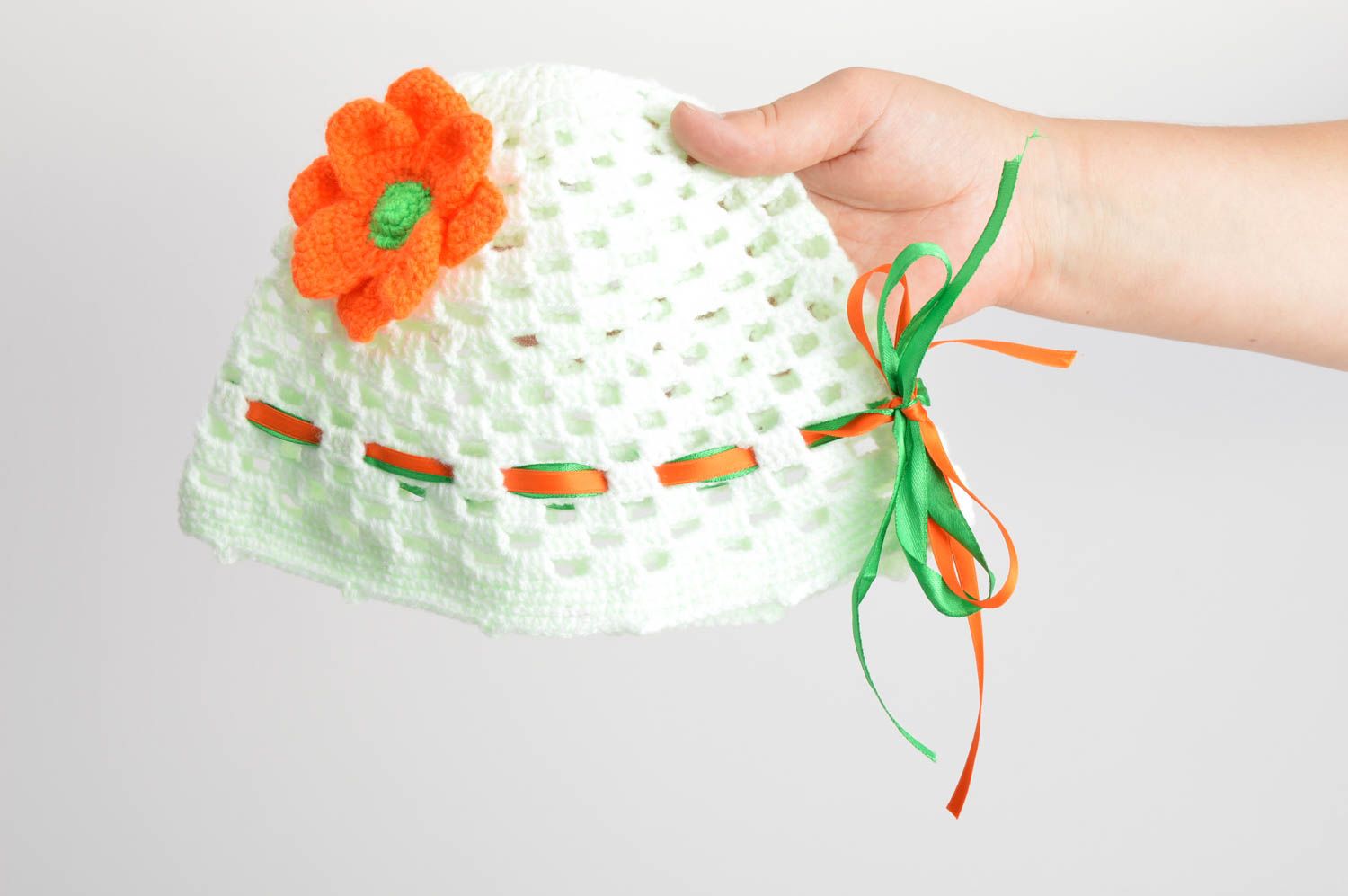 Handmade hat for girls crocheted of lime threads decorated with knitted flower photo 5