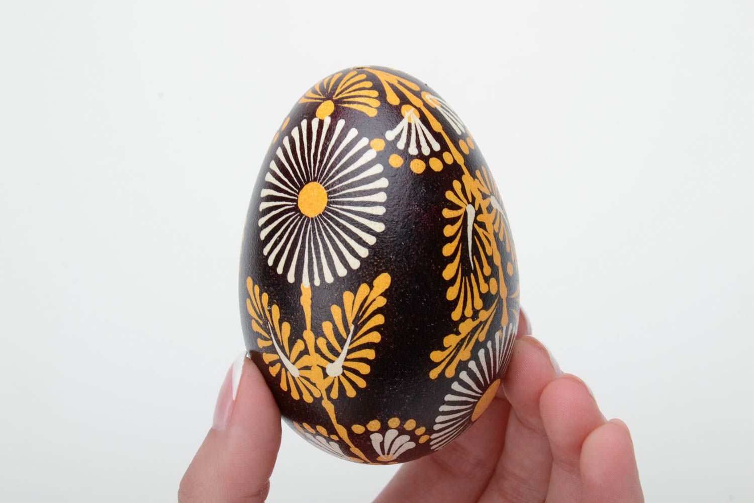 Handmade Lemkiv decorative Easter egg with bright flowers on black background photo 5