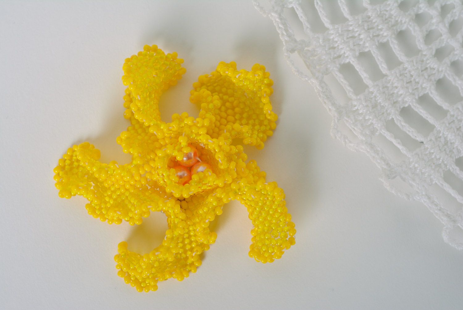 Beautiful bright yellow brooch woven of beads in the shape of volume flower photo 1