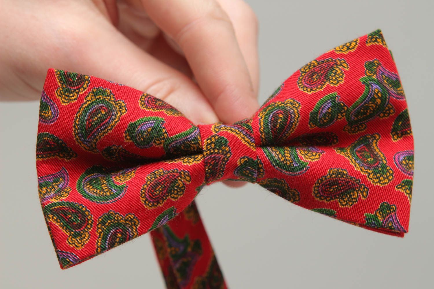 Red fabric bow tie with ornament photo 4