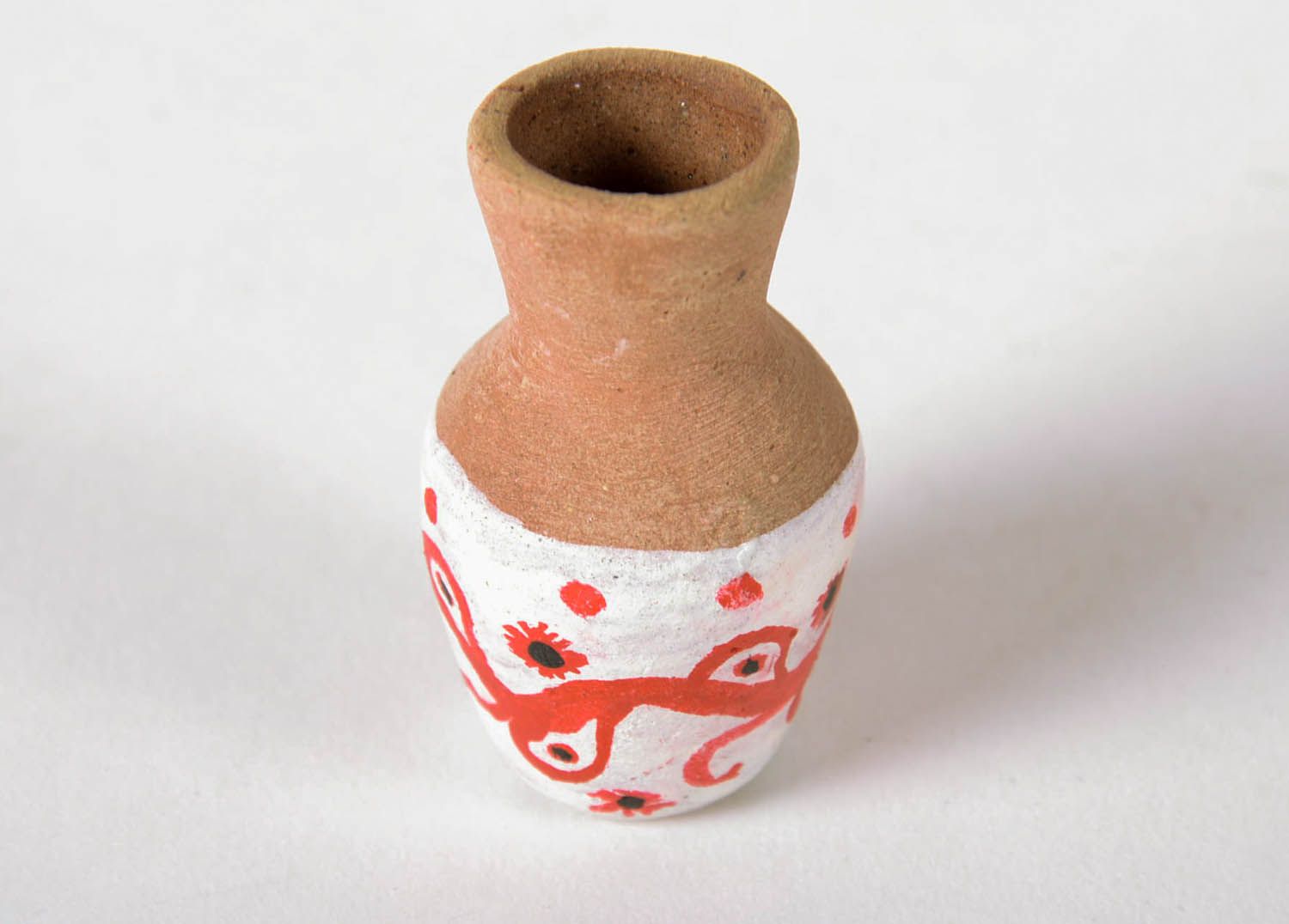 Figurine en céramique en forme de cruche photo 3