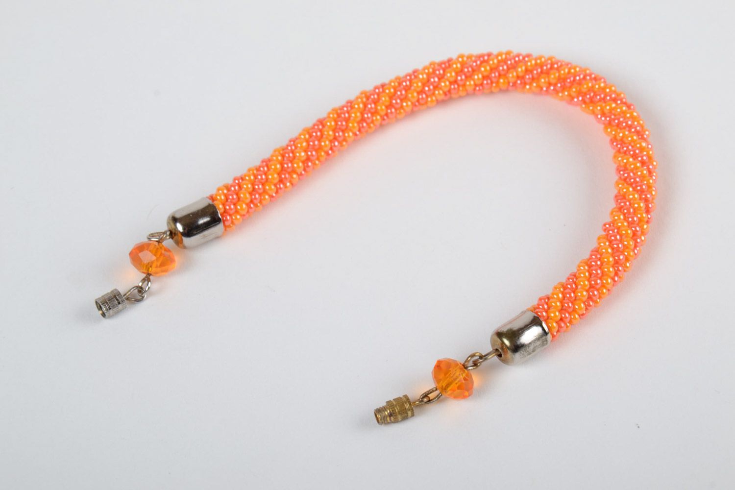 Handmade female bright beautiful designer beaded cord bracelet in orange color photo 4
