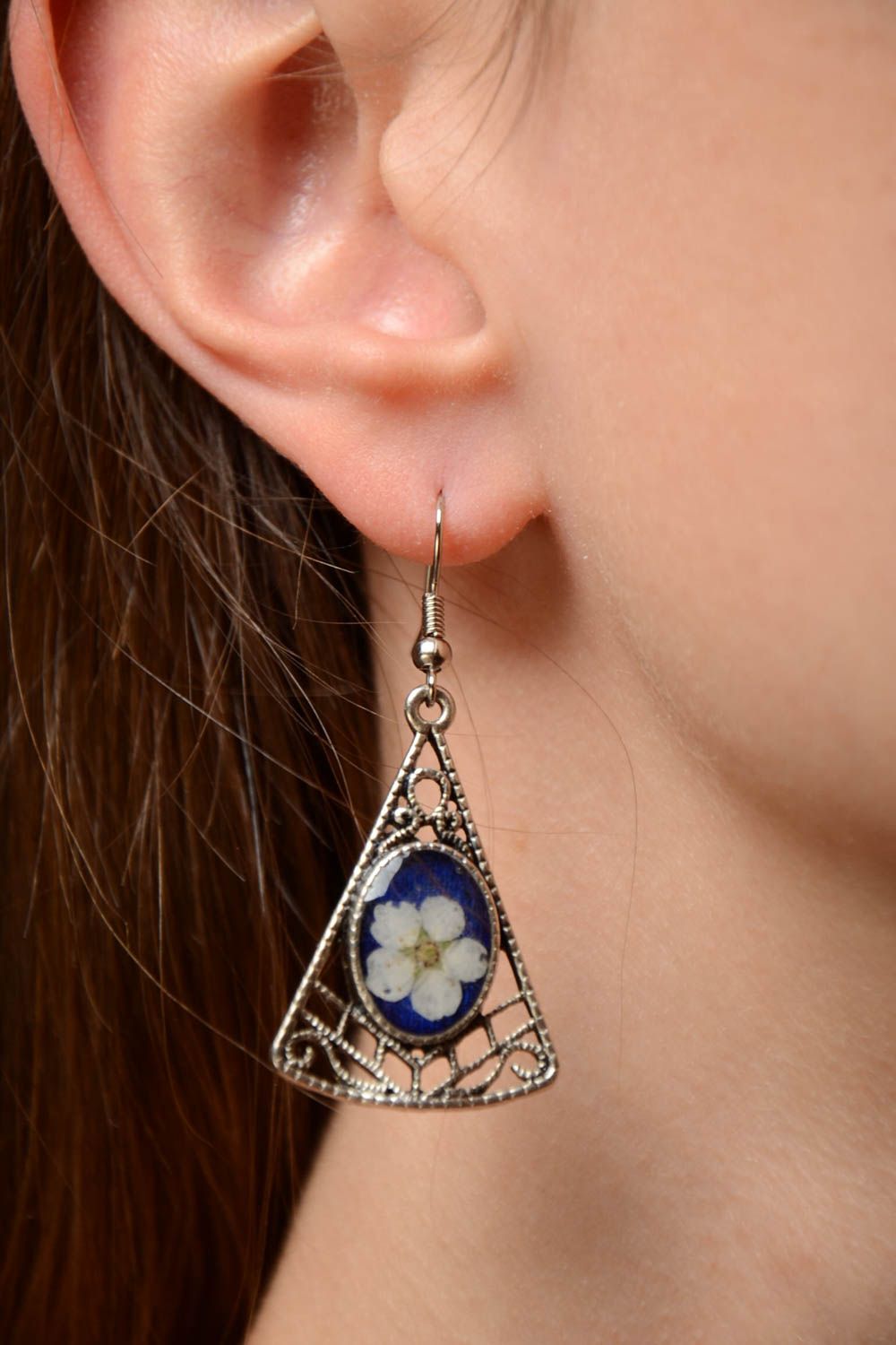 Handmade metal triangle dangling earrings with real flowers in epoxy resin photo 2