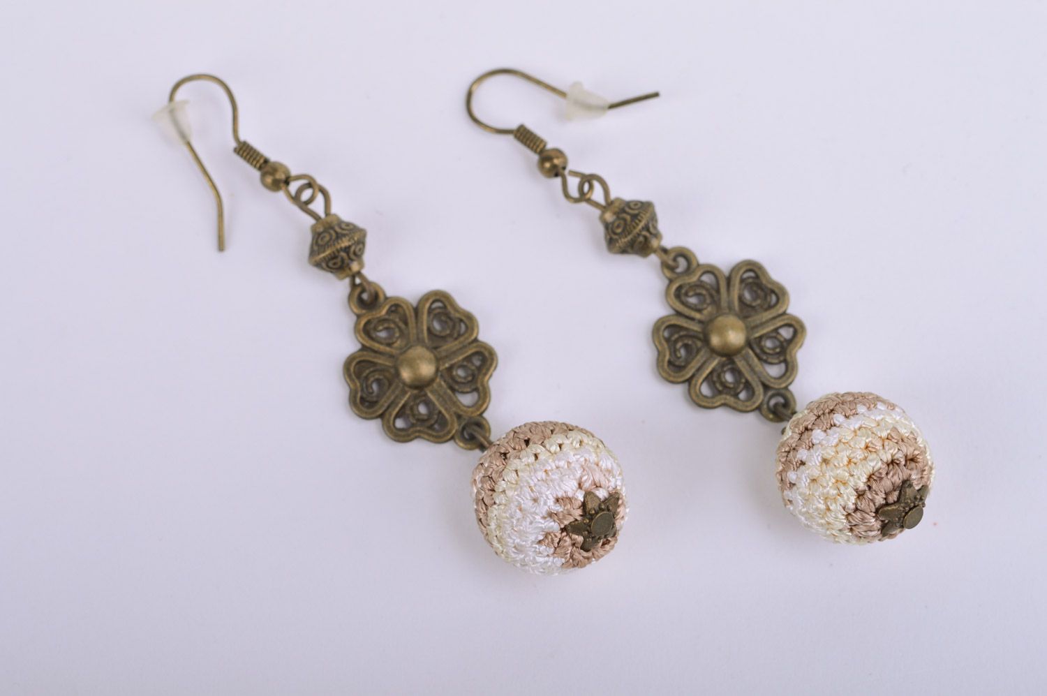 Handmade dangle earrings with metal fittings and light crocheted over beads photo 2