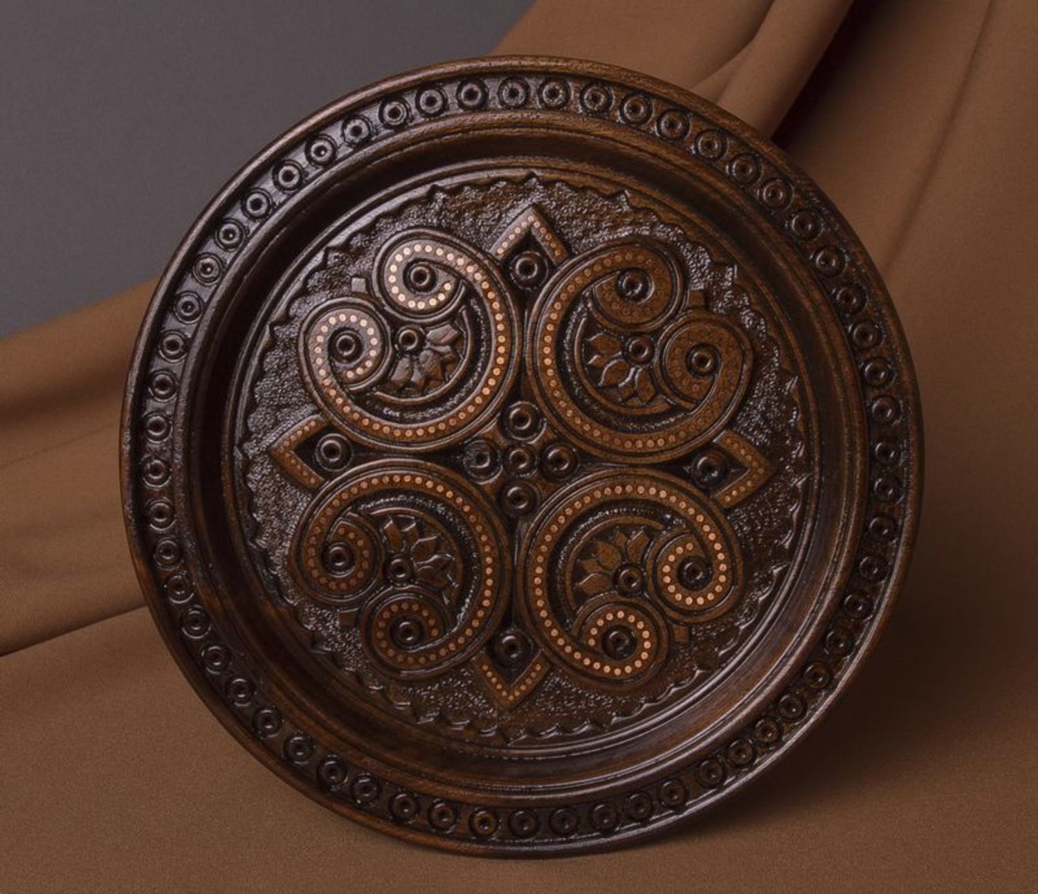 Decorative carved plate photo 1