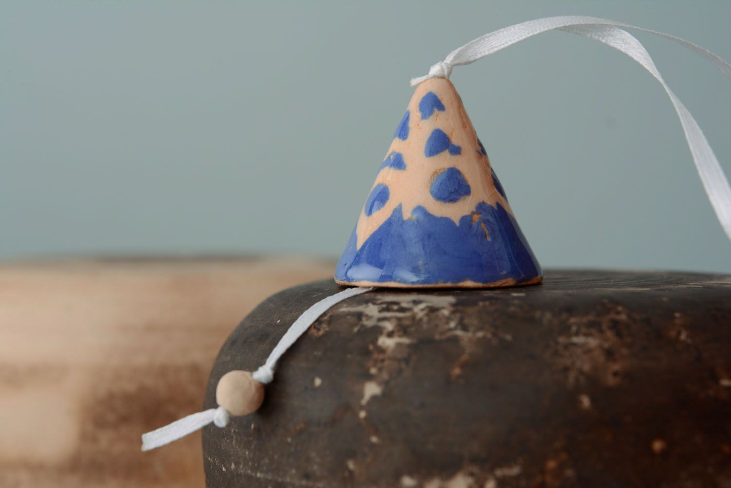 Painted clay bell photo 1