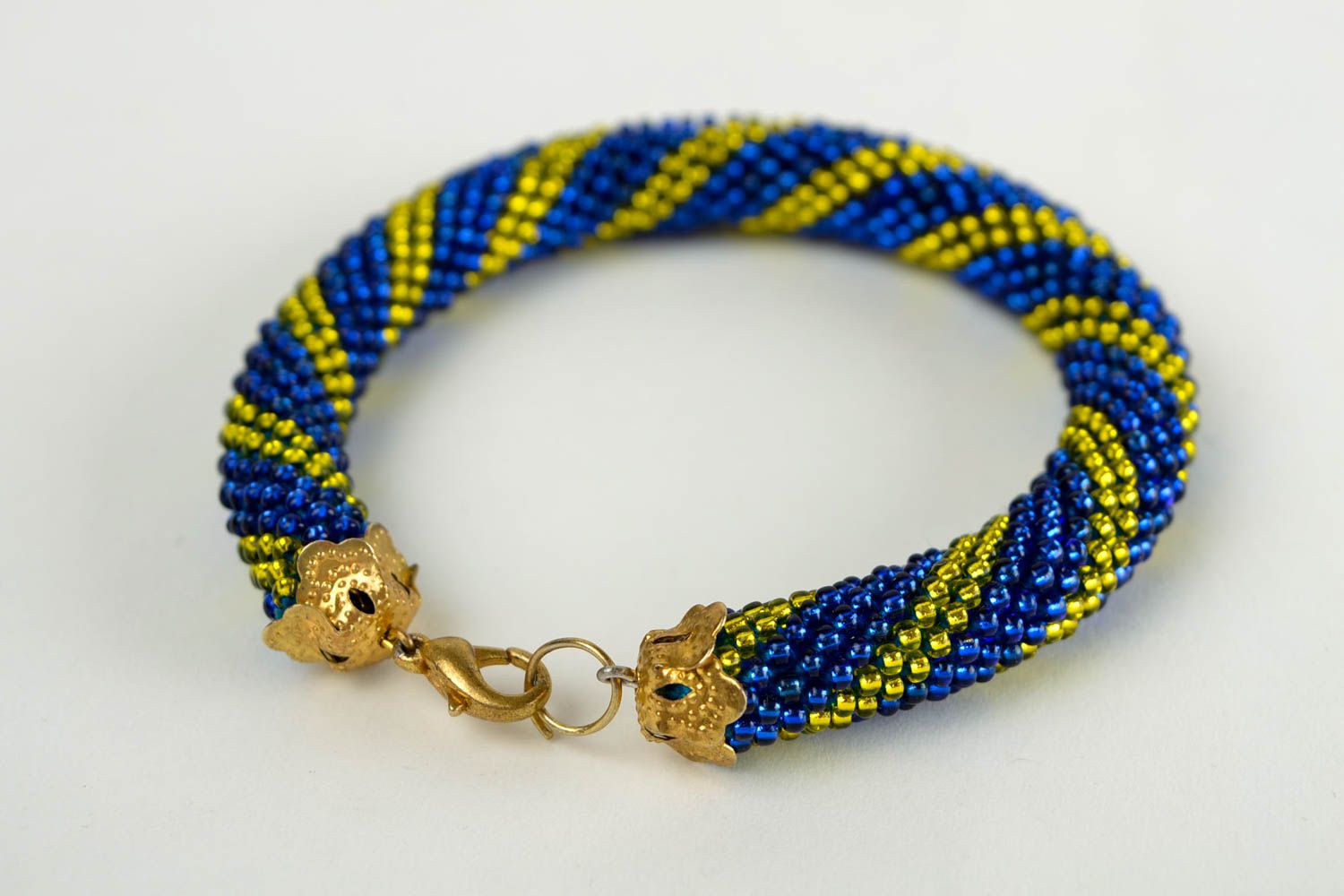 Beaded cord bracelet in dark blue and yellow beads for young girls photo 5
