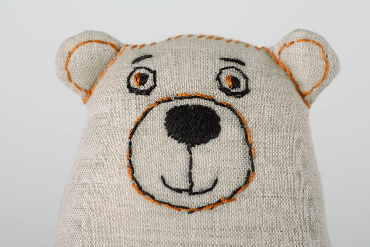 Handmade soft toy bear sewn of one colored and patterned linen with embroidery photo 2