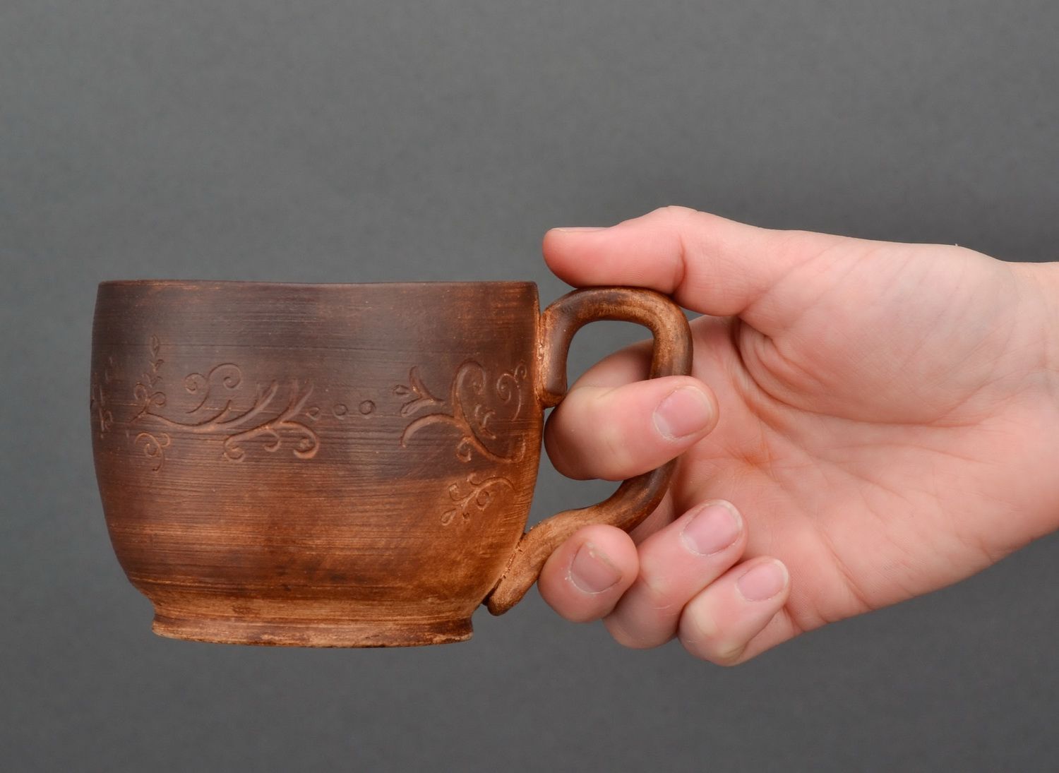 Red clay not glazed drinking cup with handle and no pattern photo 5