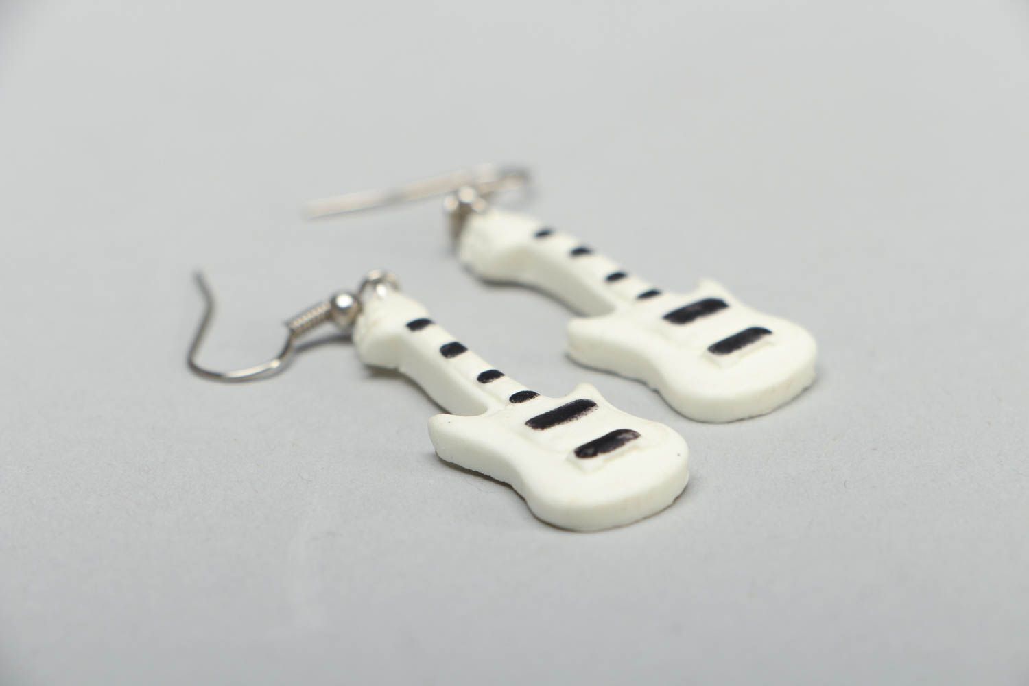 Polymer clay earrings in the shape of guitars photo 2