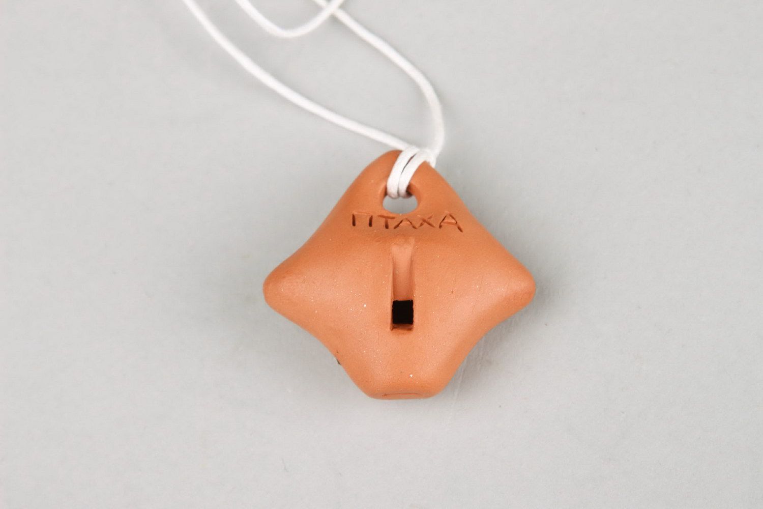 Rhomb-shaped tin whistle pendant made of clay photo 5