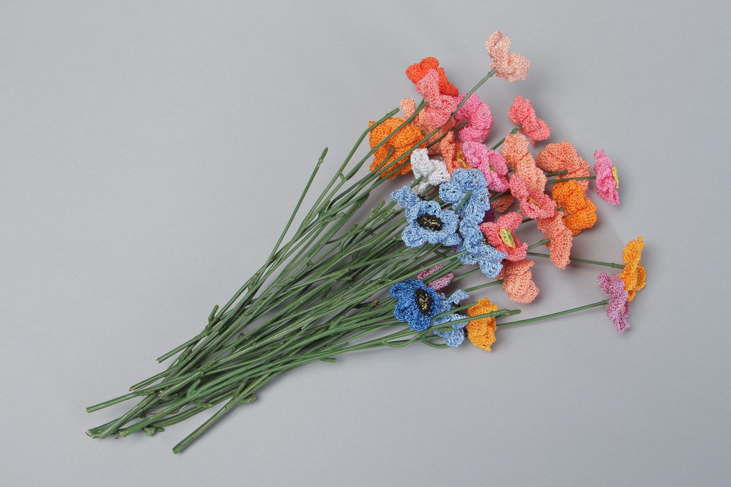 Bouquet of bright colorful decorative flowers crocheted of cotton threads photo 2