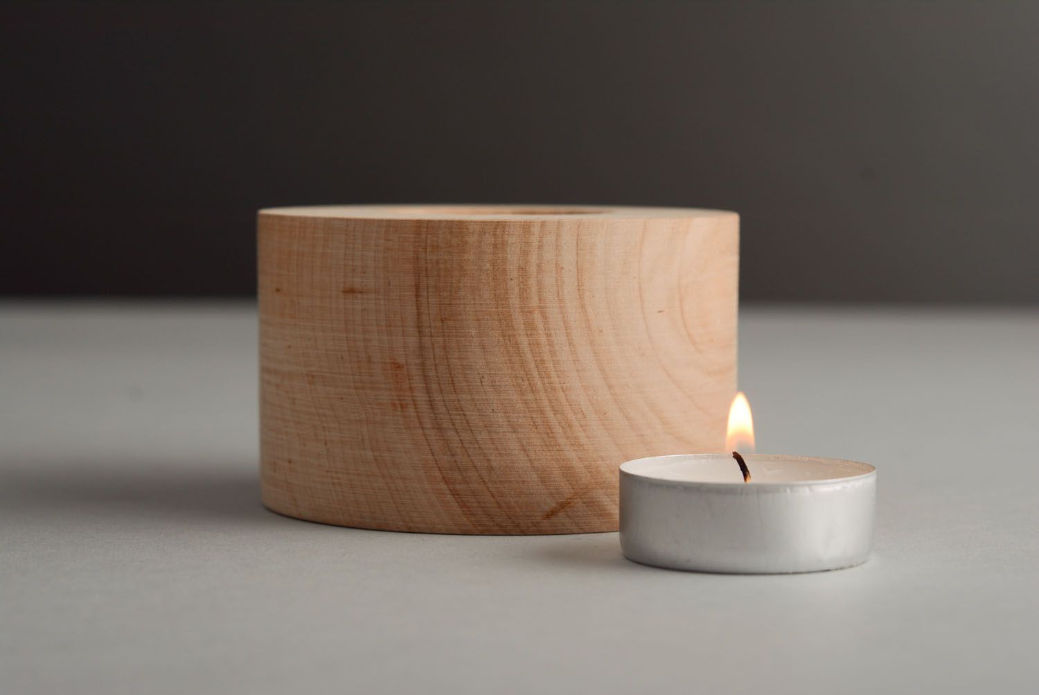 Stand for candle made of wood photo 2