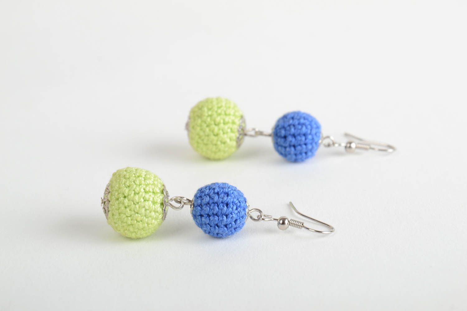 Handmade earrings with beads crocheted over with yellow and blue threads photo 5