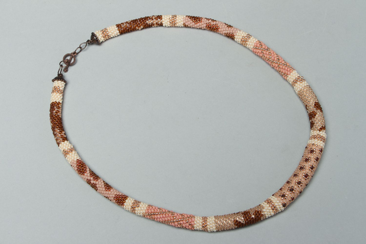 Beautiful beige beaded cord necklace photo 1