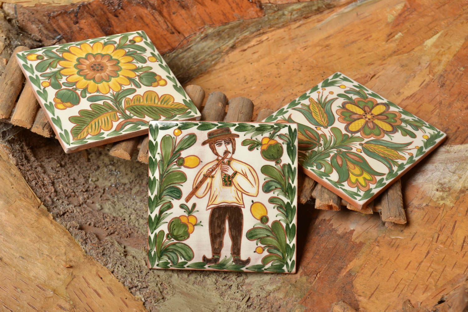Set of handmade decorative ceramic tiles painted with engobes with ethnic motifs photo 1