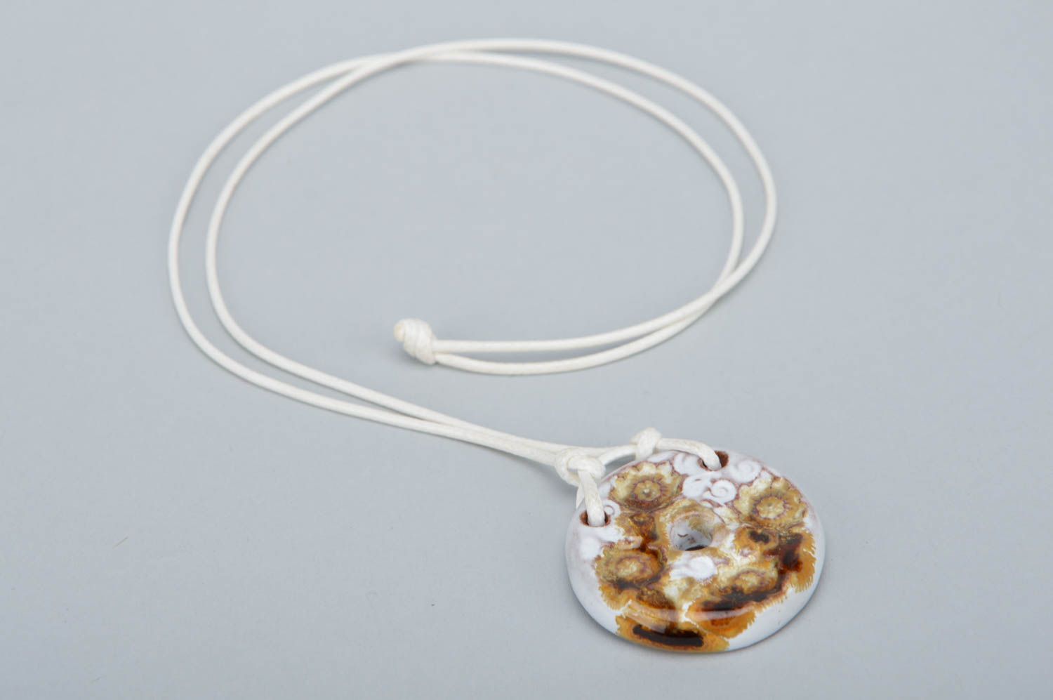 Beautiful handmade designer round shaped glazed clay neck pendant on cord photo 2