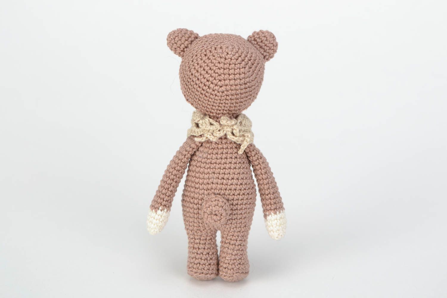 Small brown handmade crochet doll in the costume of bear photo 4