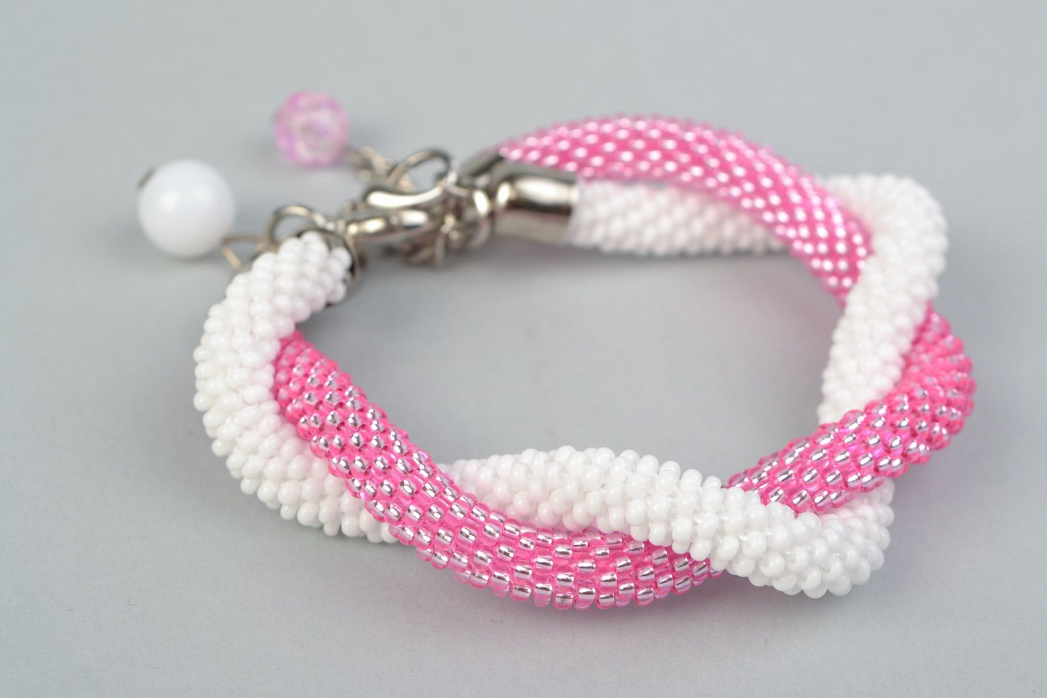 Set of 2 handmade beaded cord women's wrist bracelets in pink and white colors photo 5