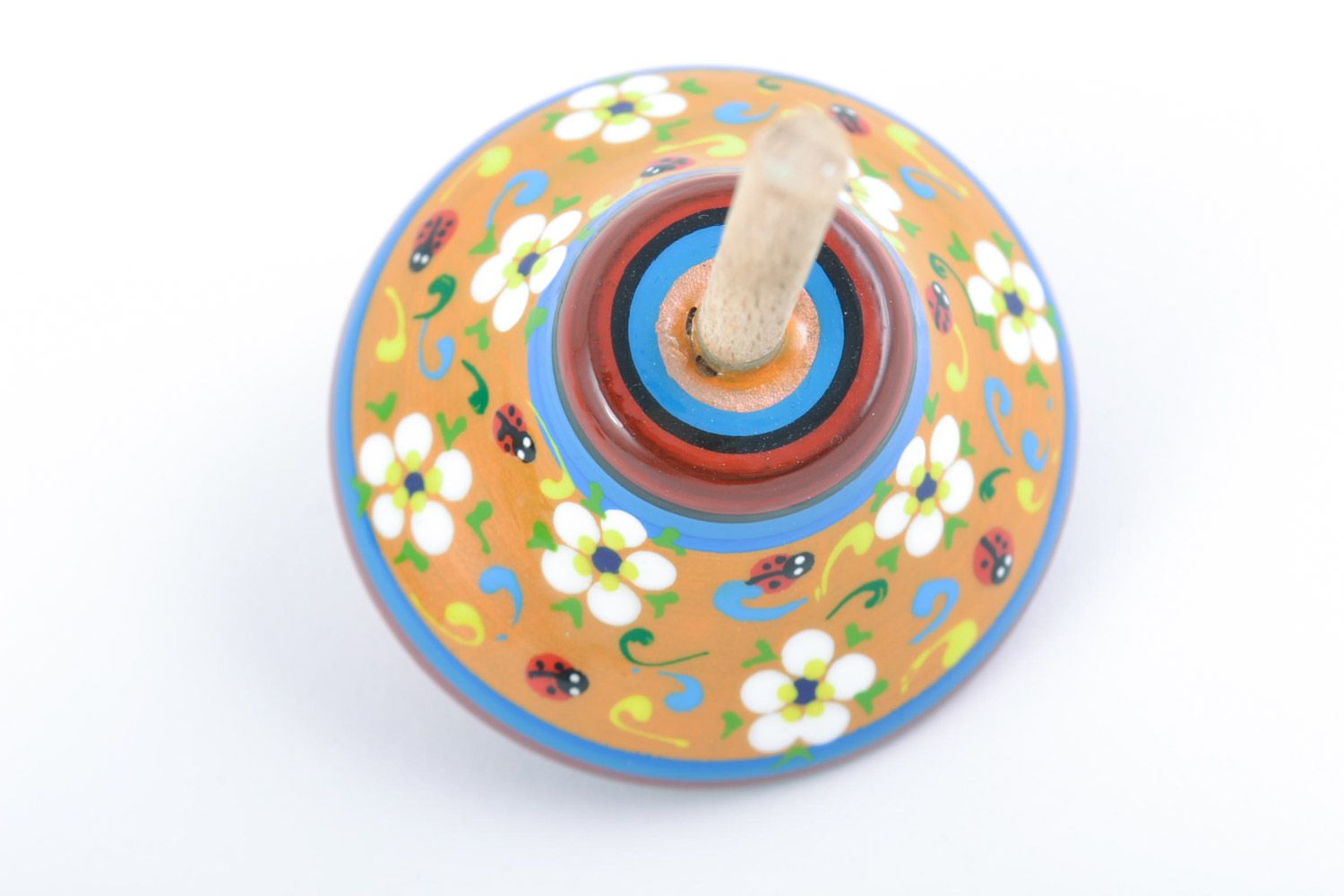 Bright handmade wooden spin top toy painted with eco dyes for children photo 4