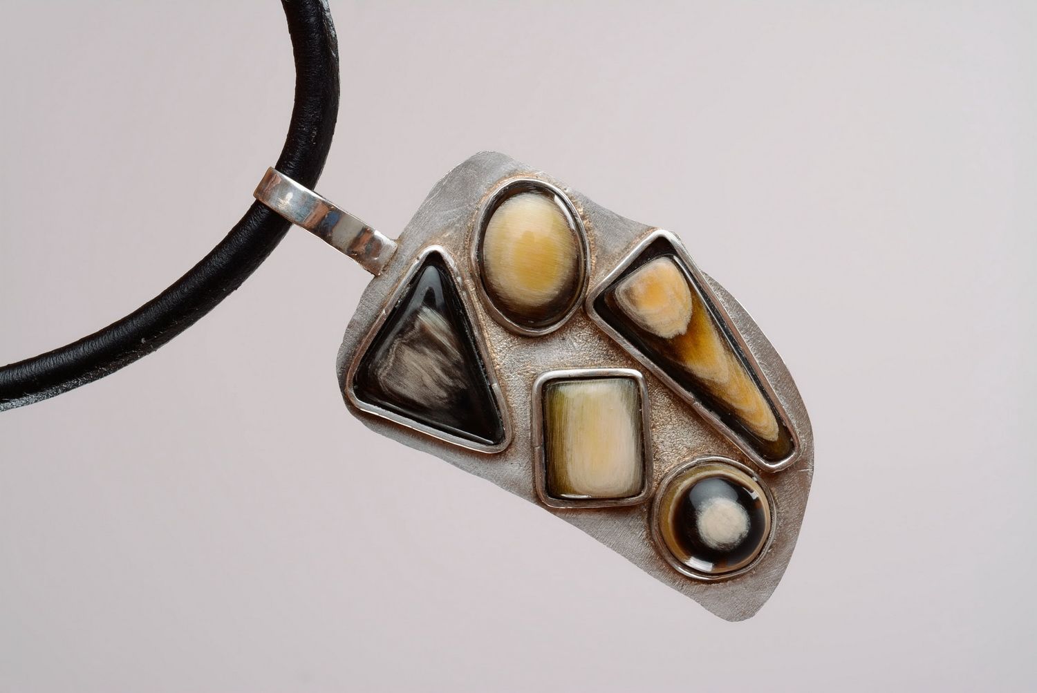 Silver pendant with inserts made of horn photo 5
